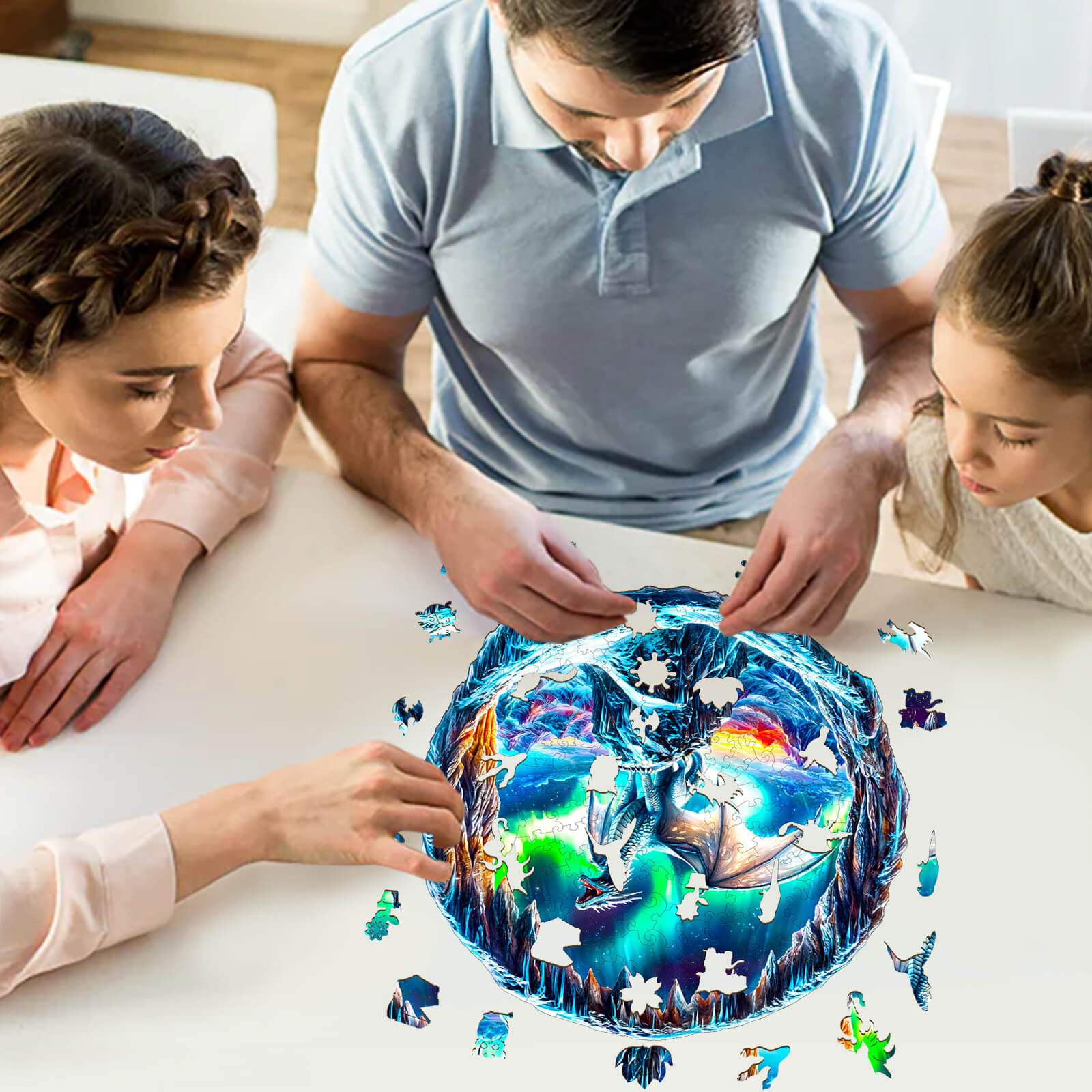 Family enjoying a 3D Aurora Dragon wooden jigsaw puzzle on a table, showcasing vibrant colors and intricate design.