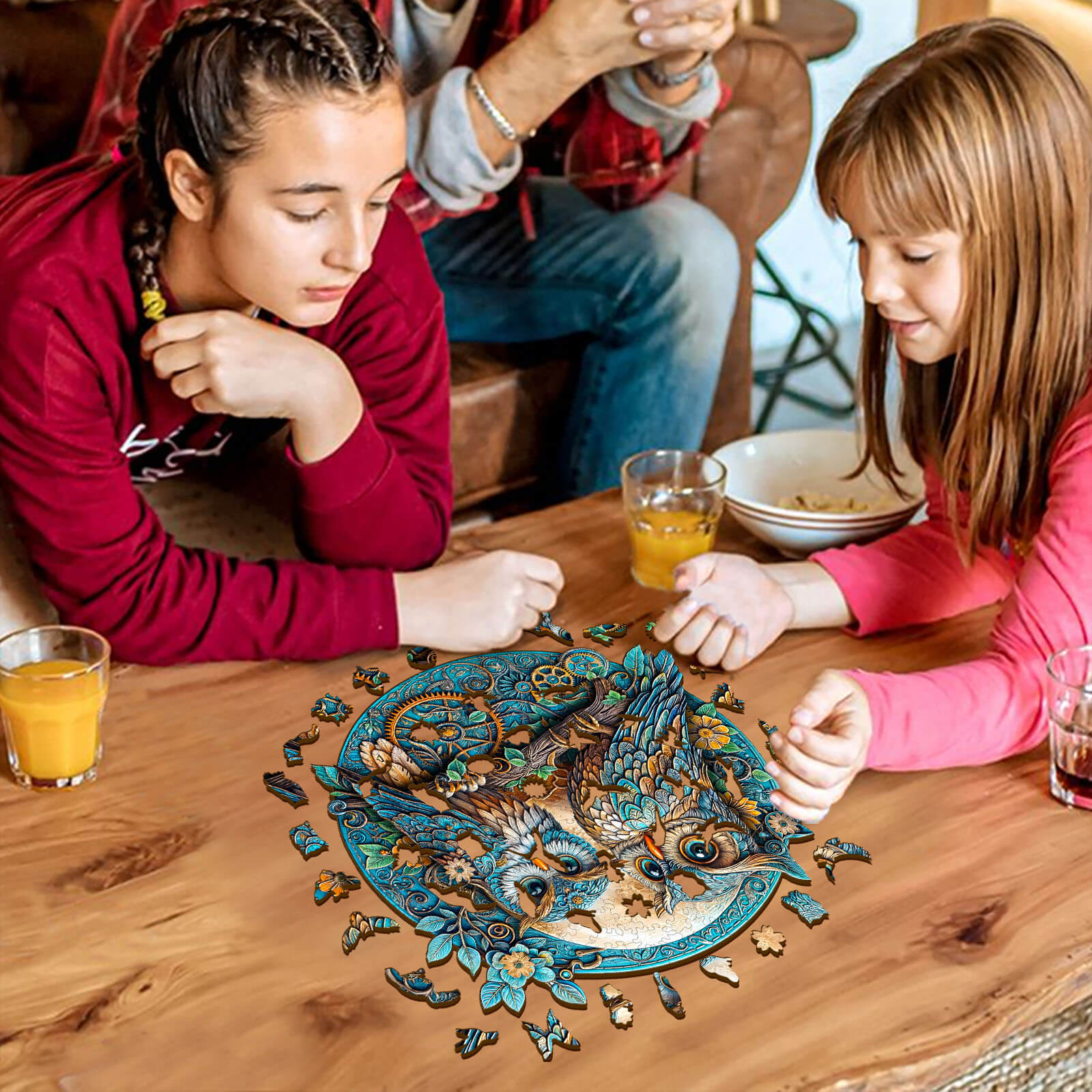 Two girls focused on an Embossed Owl wooden jigsaw puzzle, enhancing their problem-solving skills together.