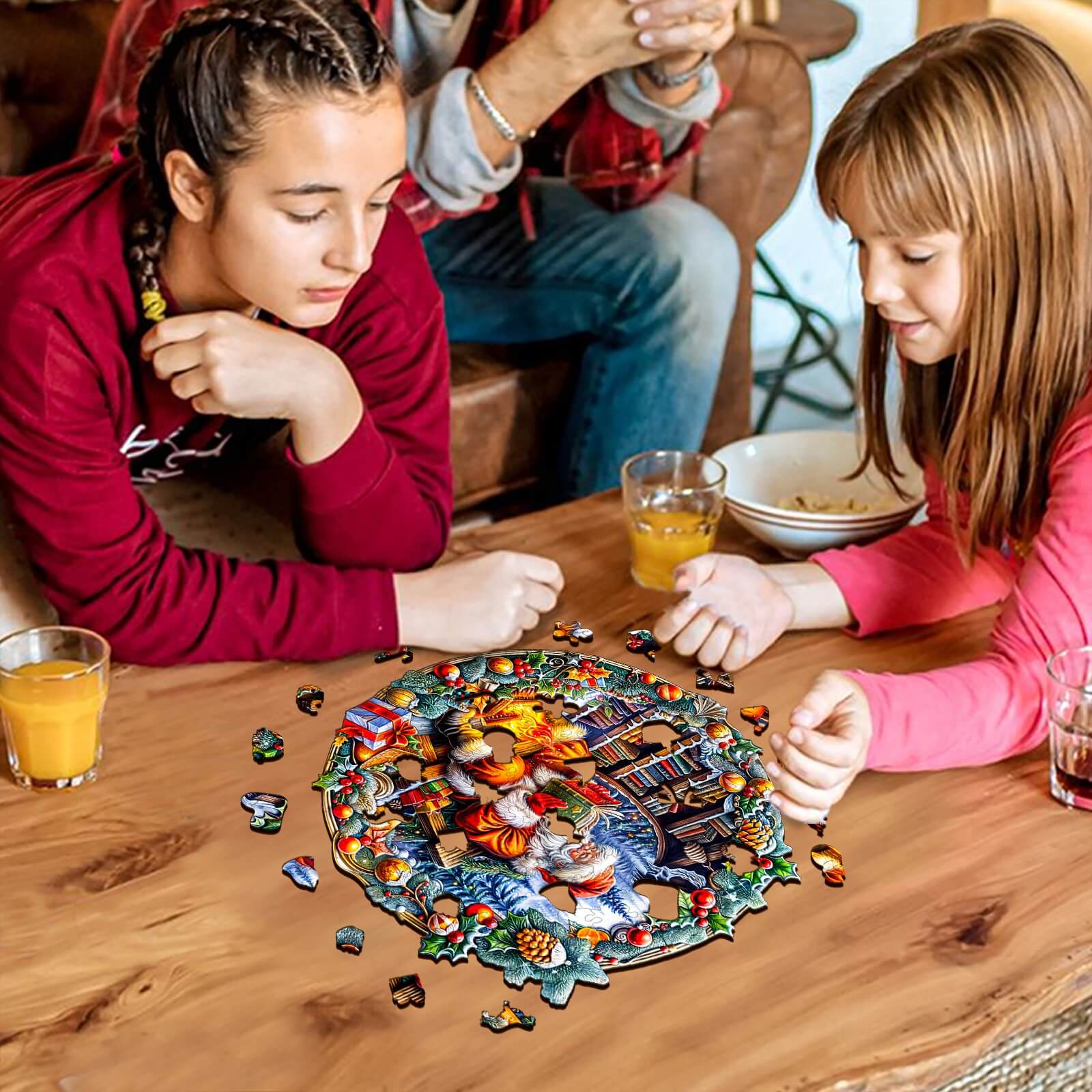 Two girls focus on assembling Santa's Rest wooden jigsaw puzzle at a cozy table, enjoying a fun activity together.