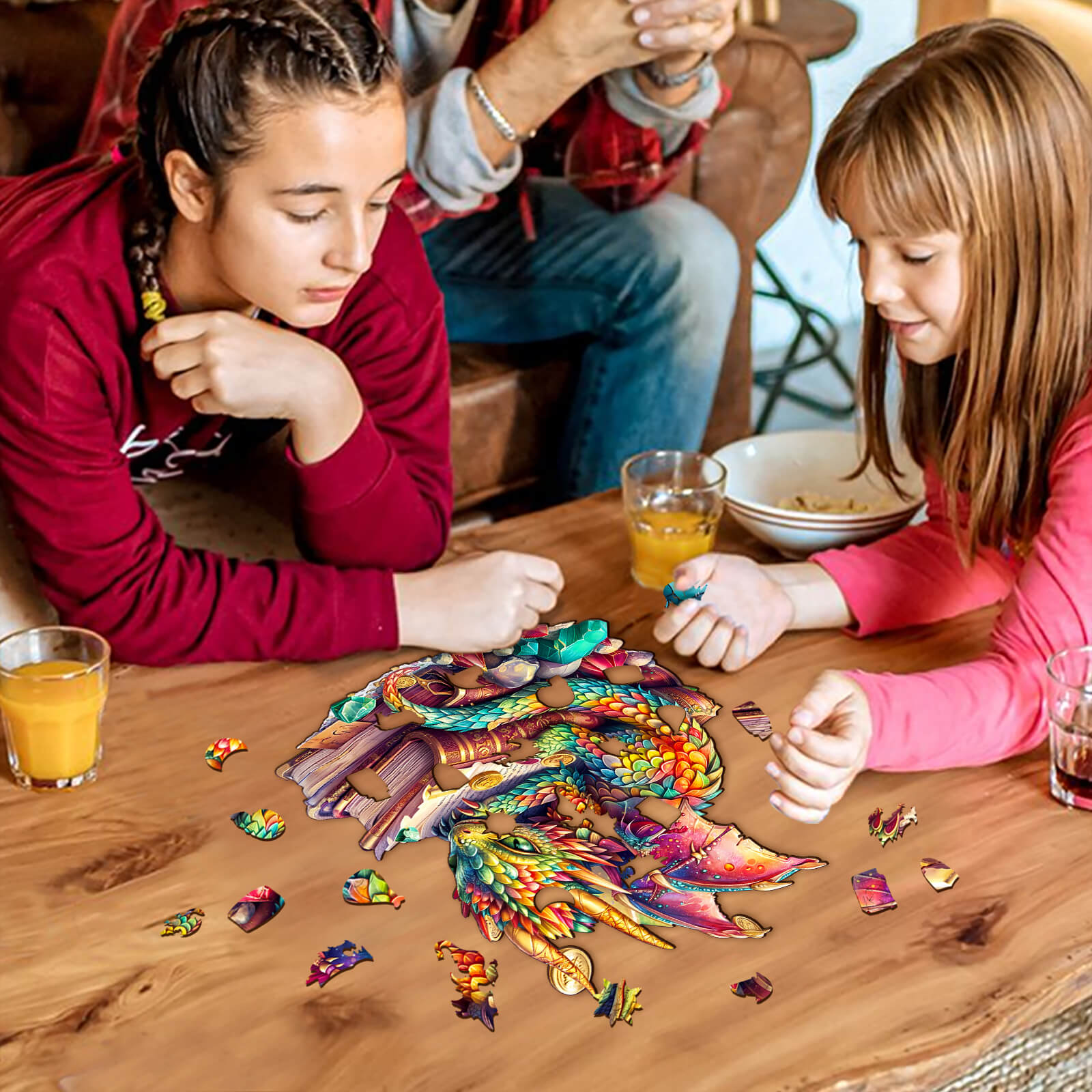 Girls solving the Jeweled Dragon Wooden Jigsaw Puzzle, enhancing focus and skills in a cozy indoor setting.