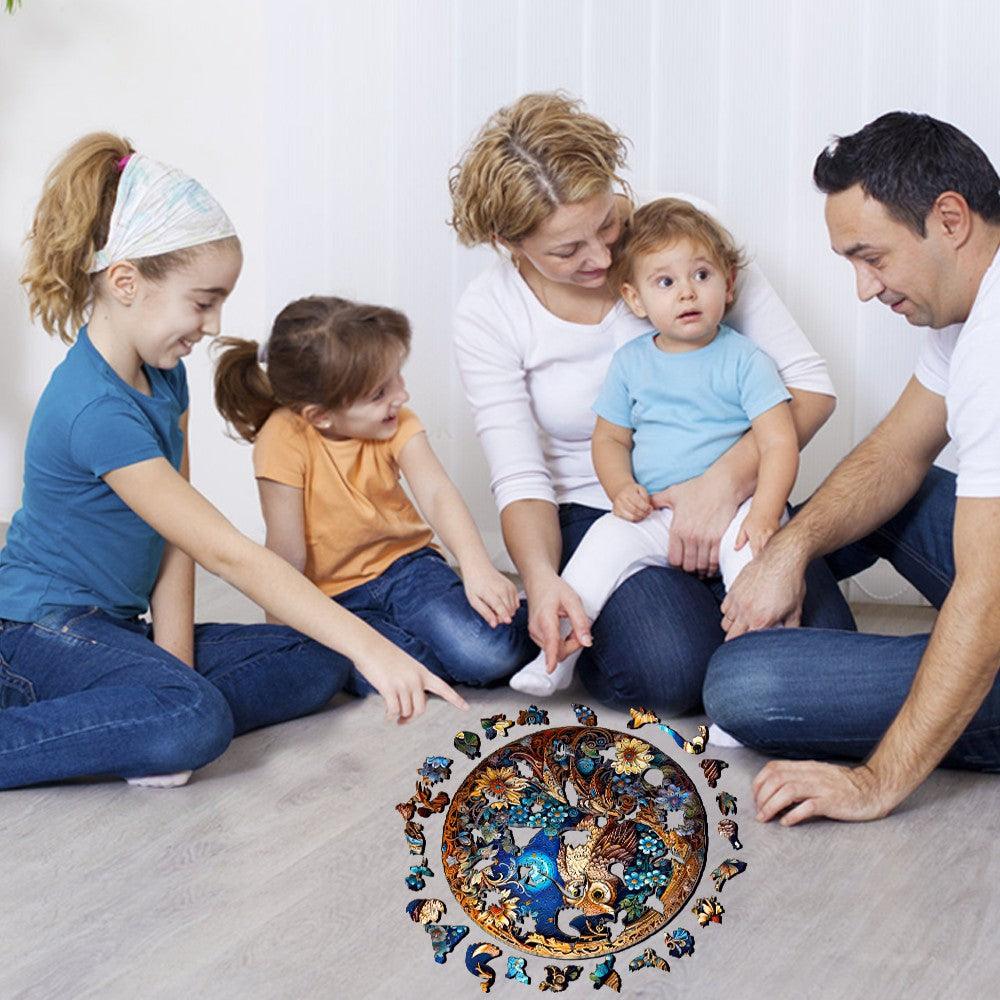 Family enjoying the Moonlight Owl wooden jigsaw puzzle together, fostering quality time and bonding.