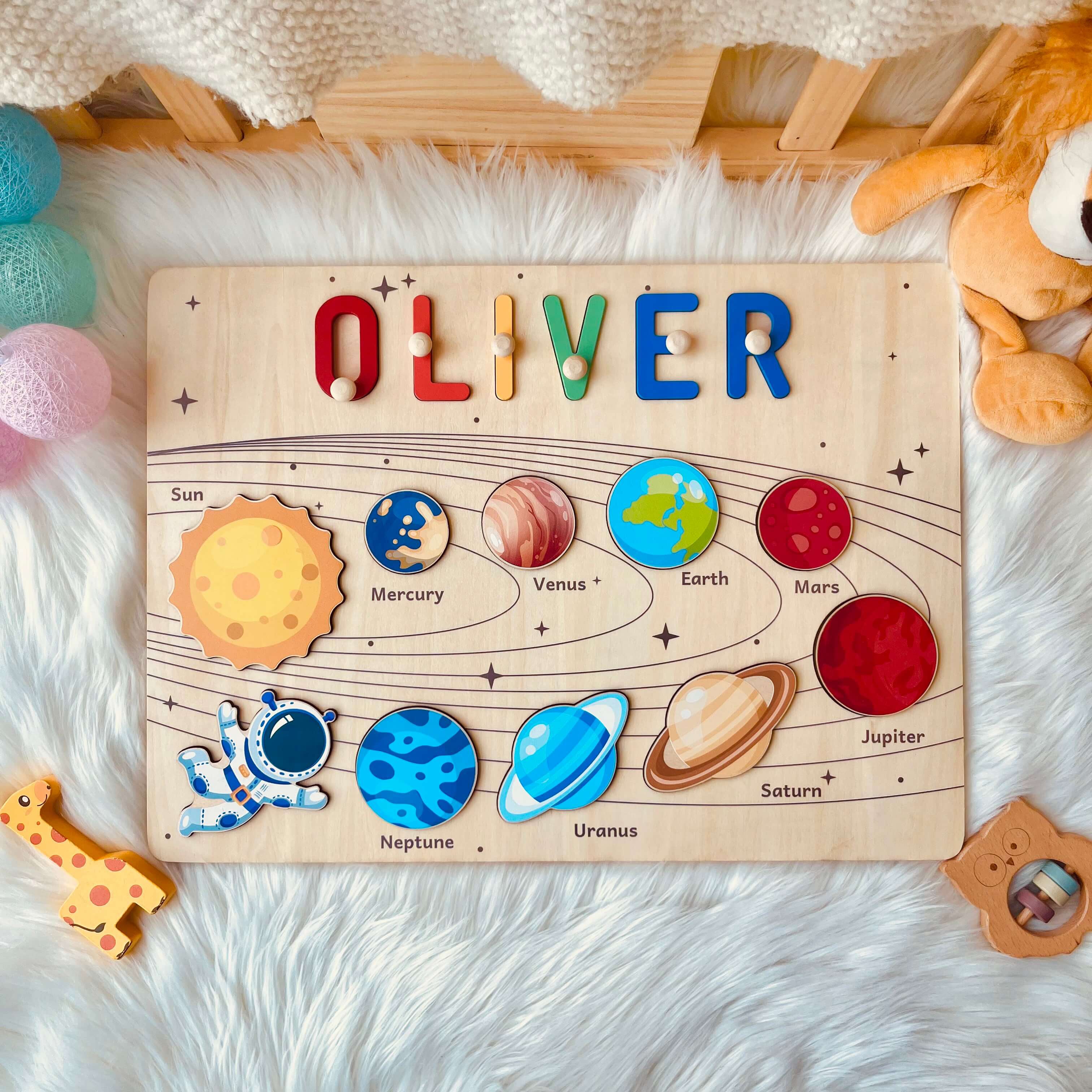 Personalized Planet Name Puzzle featuring colorful planets and child's name 'OLIVER' for educational play.