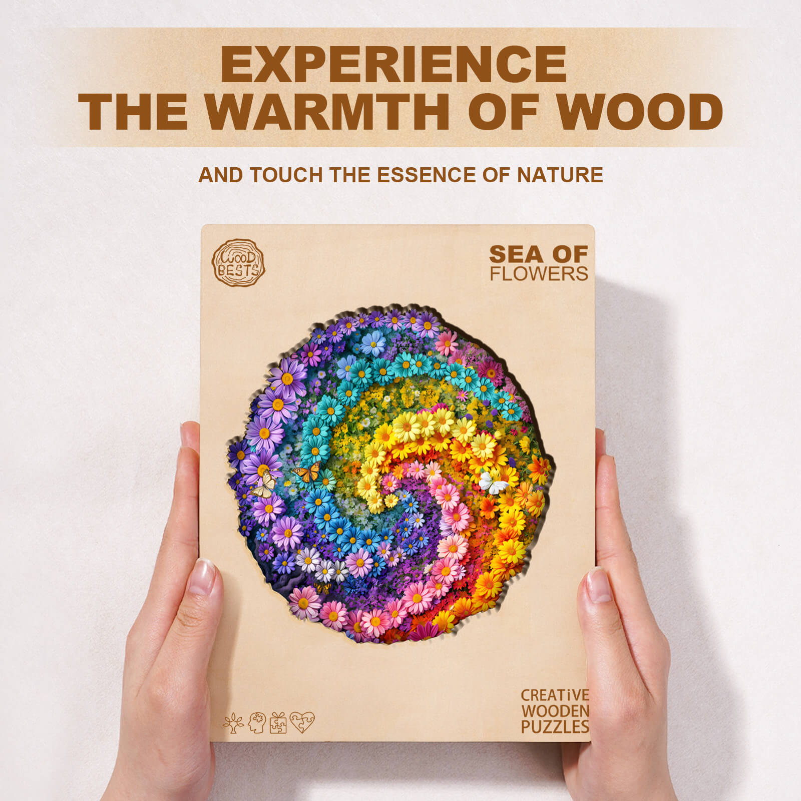 Sea of Flowers wooden jigsaw puzzle displayed in hands, showcasing vibrant floral design and natural warmth.