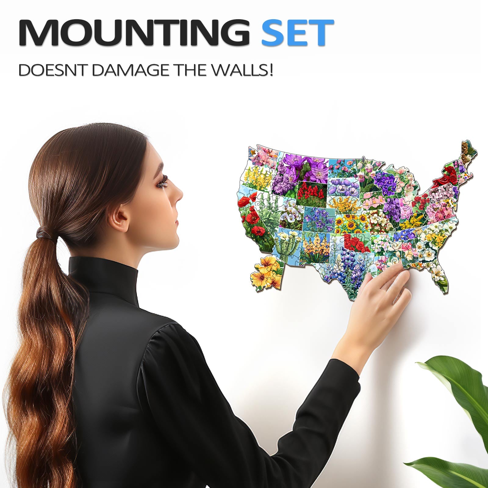 Woman mounting a wooden USA state flowers jigsaw puzzle on the wall with no damage, emphasizing the easy application.