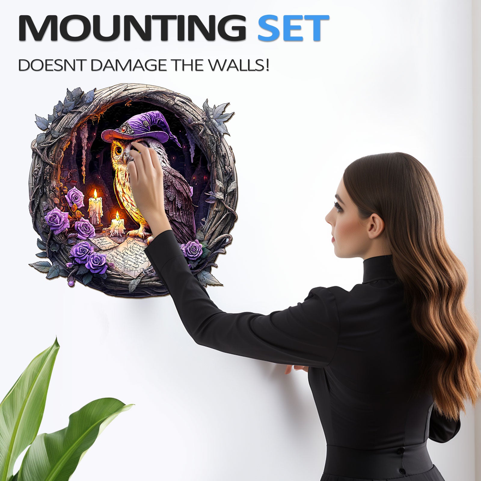 A woman using a mounting set on a wall featuring a 3D Witch Owl design, emphasizing no wall damage and aesthetic appeal.