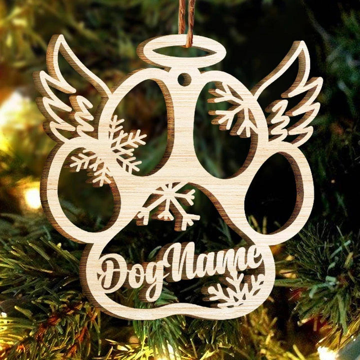 Personalized wooden dog paw angel wings ornament with snowflakes for Christmas decoration.
