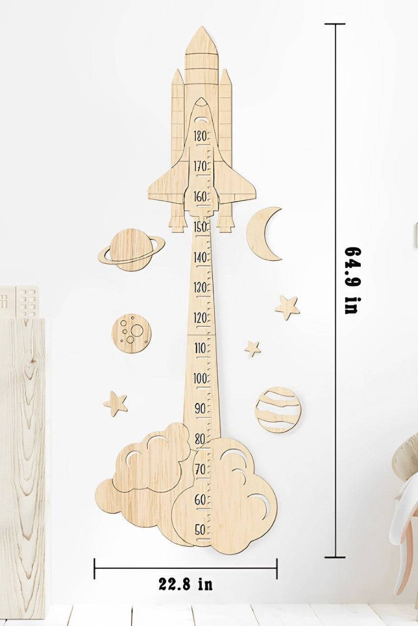 Personalized wooden rocket growth chart ruler with colorful planet and star design, measuring up to 64.9 inches tall.