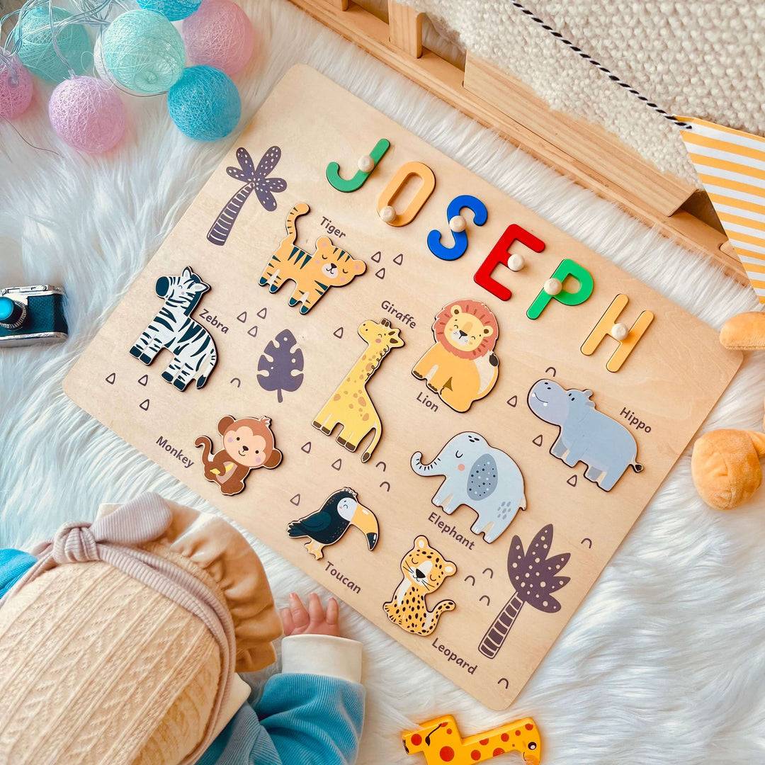 Personalized jungle animal name puzzle featuring colorful letters and cute animal figures for kids' playroom.