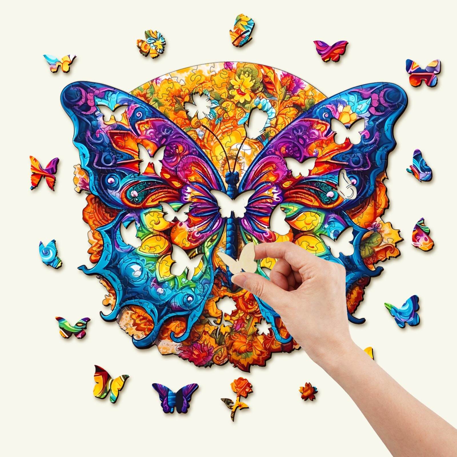 Hand assembling a colorful Mandala Butterfly wooden jigsaw puzzle with unique animal-shaped pieces.