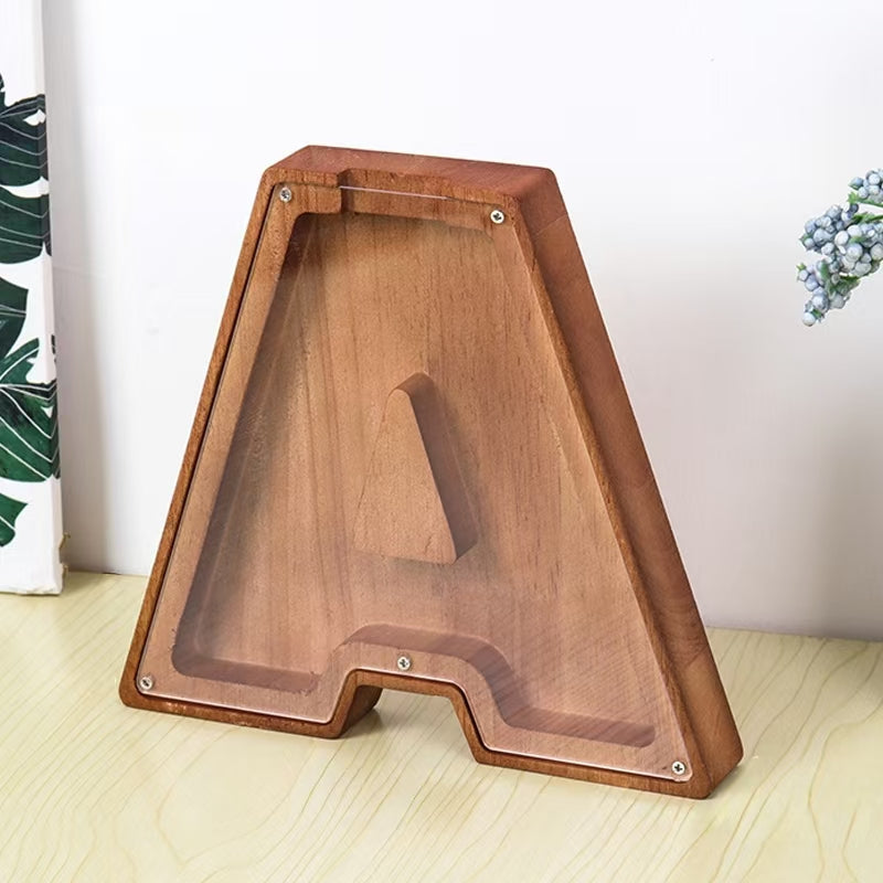 Personalized wooden letter piggy bank 'A' for kids, teaching financial awareness and savings.