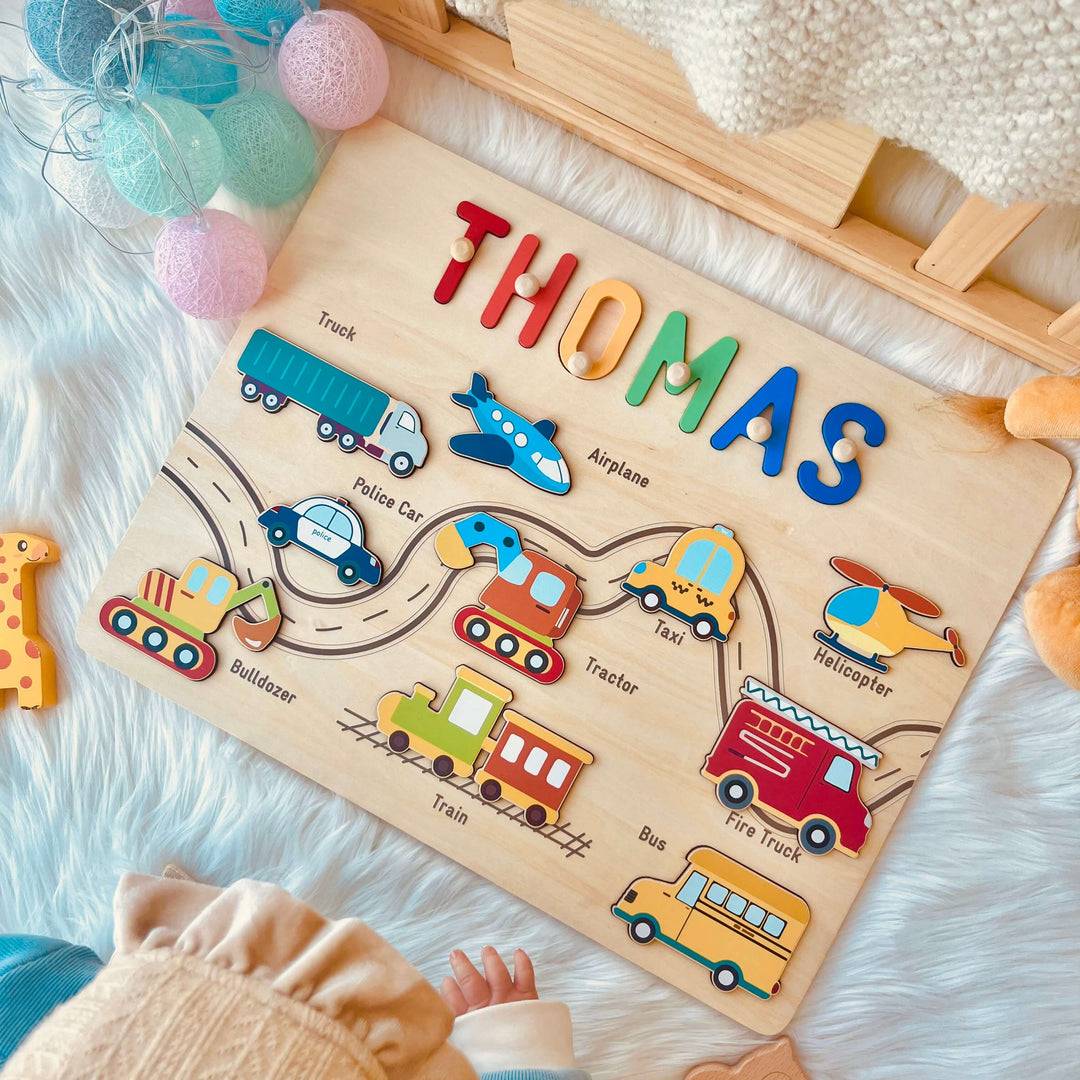 Personalized Traffic Name Puzzle for kids featuring vehicles and custom name 'THOMAS' on a wooden board.