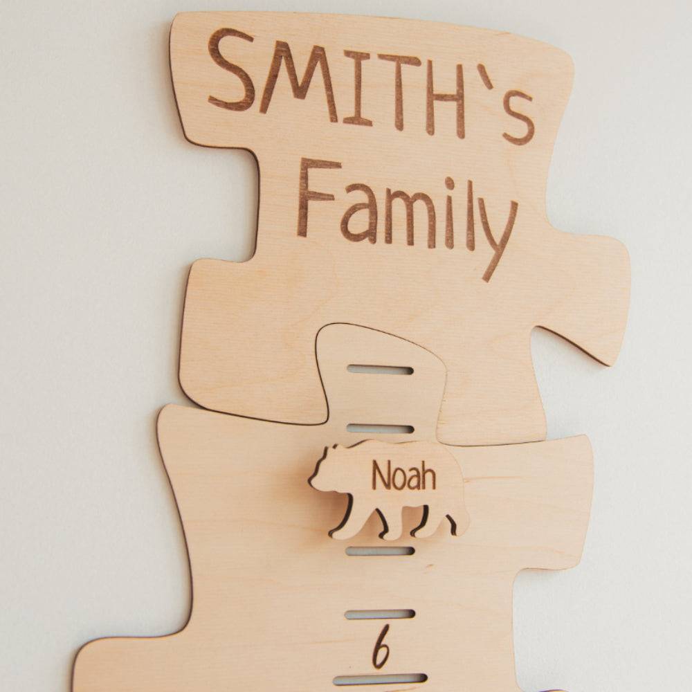 Personalized wooden growth chart featuring 'Smith's Family' and height markers for kids with bear design.