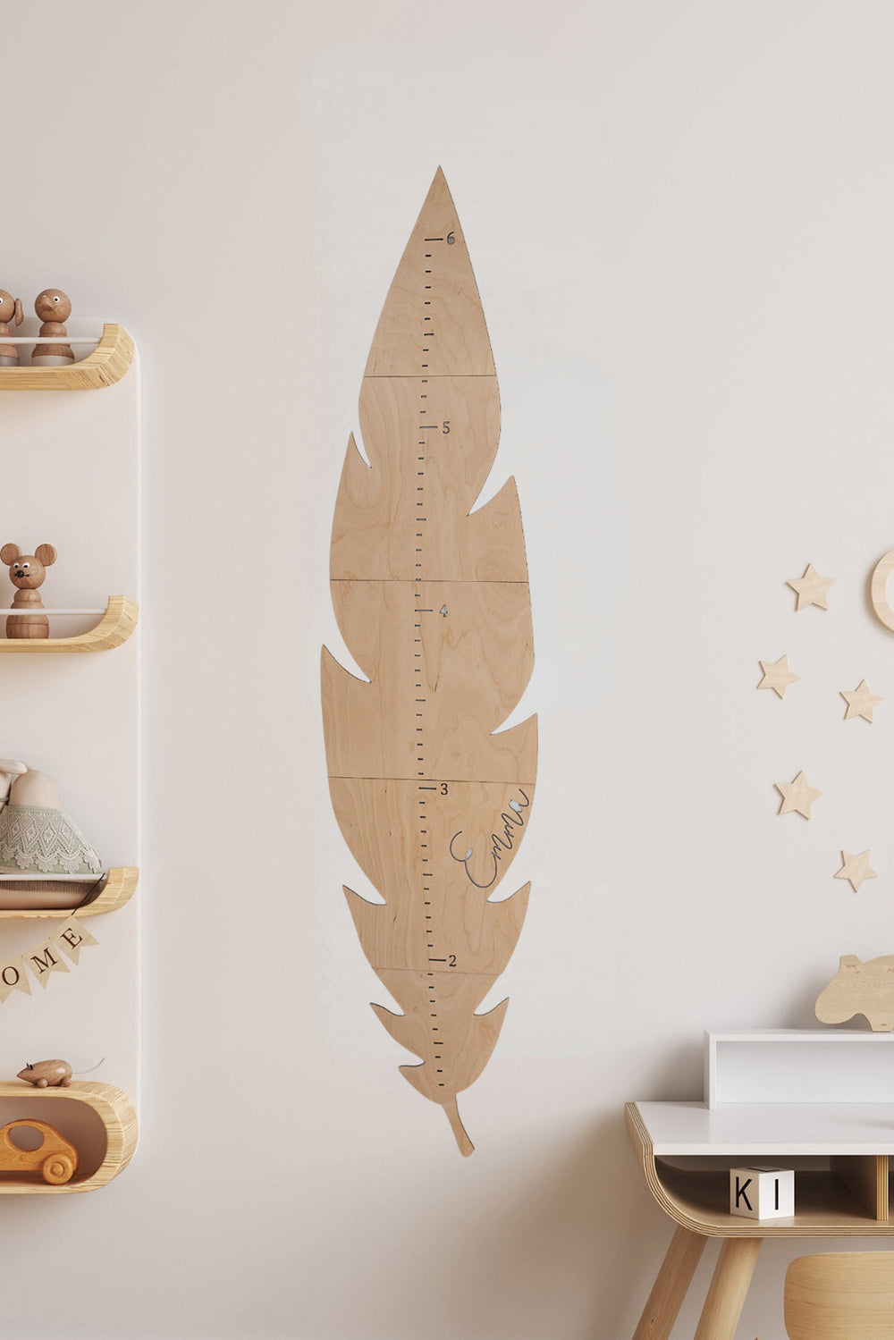 Personalized wooden feather growth chart for kids, stylish Bohemian wall decoration and height tracker.