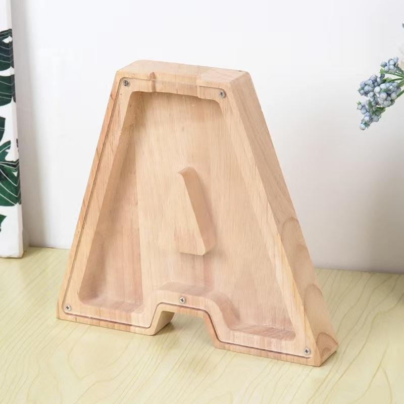 Personalized wooden letter piggy bank for kids, shaped like the letter A, promoting saving awareness.